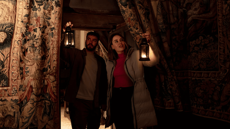 Visitors enjoying the lantern tour at Hardwick Wintertide